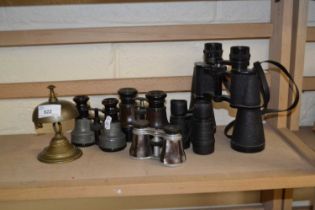 A pair of Grosvenor 12 x 15 binoculars together with three other binoculars, opera glasses and brass