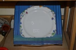 A box set of floral decorated dinner wares