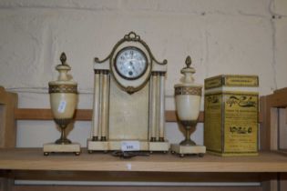 A cream painted wooden mantel clock and a Vapo-Resolene