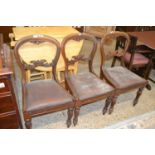 Three Victorian balloon back dining chairs