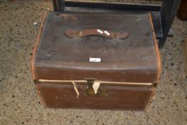 Small leather mounted trunk