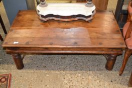 Hardwood coffee table with iron detail