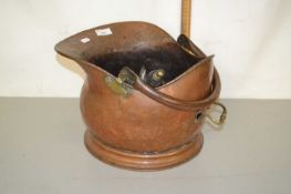 Copper coal bucket, a trivet and a brass pestle and mortar