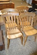 Two pairs of hard seated kitchen chairs