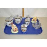 Tray of various Royal Worcester egg coddlers, Coalport model cottages etc