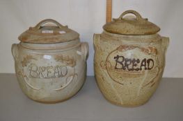 Two pottery bread bins