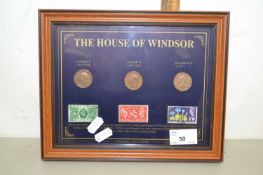 A framed House of Windsor coin and stamp set