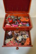 A case of assorted costume jewellery