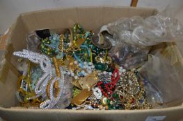 A large box of various costume jewellery