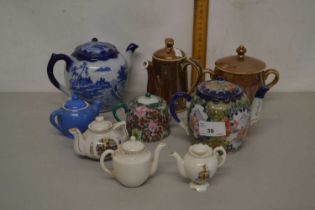 Collection of various small Oriental and other teapots