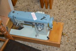 A cased Jones sewing machine