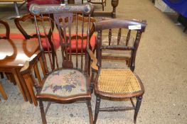Early 20th Century stick back armchair with later tapestry dated 1947 together with a cane seated