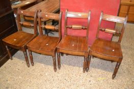 Set of four 19th Century mahogany hard seated kitchen chairs, two with significant splits to seats