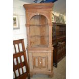Large pine corner cabinet with open top section and covered base