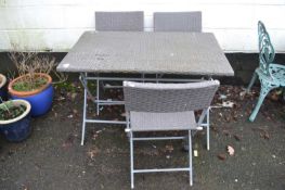 Modern garden table and three chairs