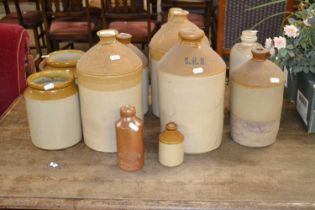 Mixed Lot: Various stone ware flagons and bottles to include Green King & Sons Bury St Edmunds,