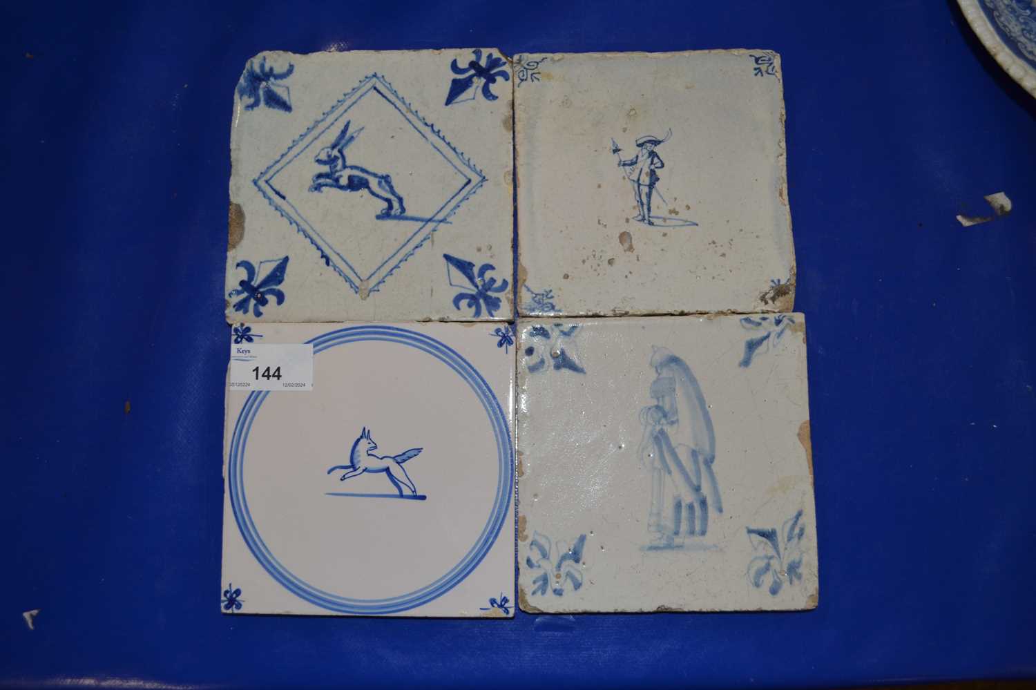 Group of three Delft tiles and one other