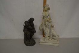 A bronzed resin model The Thinker together with a further bronzed resin model of a lady with a