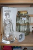 A Royal Doulton glass decanter and a glass storage jar