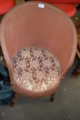 Pink round wicker chair