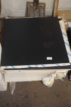Eight boxes of large 18" x 18" black vinyl floor tiles and others