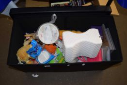Storage box with upholstered lid and assorted contents
