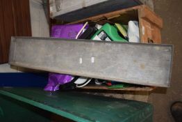 A box of various garage clearance items