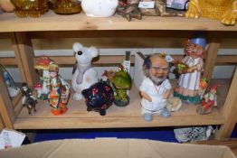 A pair of gnome book ends and other figurines
