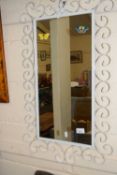 White metal framed wall mirror