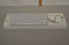 Two Apple Mac keyboards and a mouse