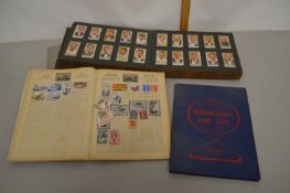 An album of various cigarette cards, two junior stamp albums and various loose stamps