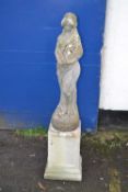Concrete statue of a young lady raised on plinth base, 120cm high