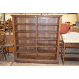 Late 19th or early 20th Century oak open front bookcase cabinet, 142cm wide