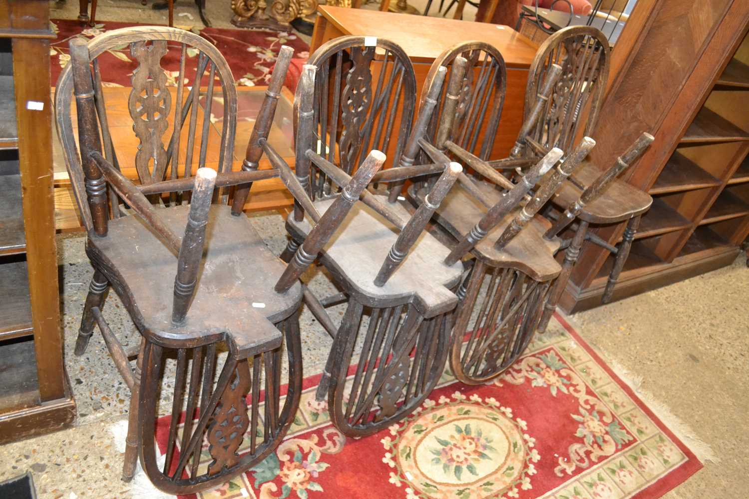 Set of seven wheel back kitchen chairs
