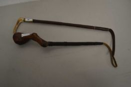 Two vintage riding crops