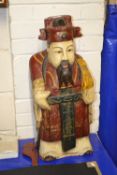 A large modern painted wooden Chinese figure of a wise man