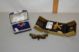Mixed Lot: A Coalport porcelain brooch, a Thai gold plated orchid brooch and a further insect brooch