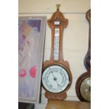 An early 20th Century oak cased barometer