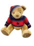 An extremely large Harrods teddy bear in knitted wool jumper and nightcap. Height approximately:
