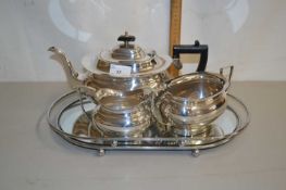 A silver plated tea set and tray