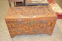 Chinese carved camphor wood blanket box with deep carved decoration