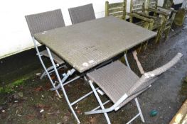 Modern garden table and three chairs