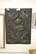 Carved oak panel decorated with a knight