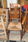 Early 20th Century oak framed rush seated chair