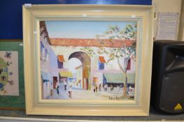 George Hann - Study of a continental street scene, oil on canvas, set in a cream painted frame, 77cm