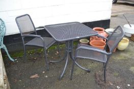 Modern bistro type garden table and two chairs with mesh work finish