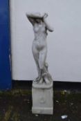 Large concrete statue of a bare breasted young lady raised on plinth base, 160cm high