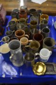 Large collection of various pewter and pottery tankards