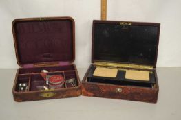 Two leather bound jewellery boxes and various contents