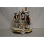 Royal Dux model of figures and a Sedan chair